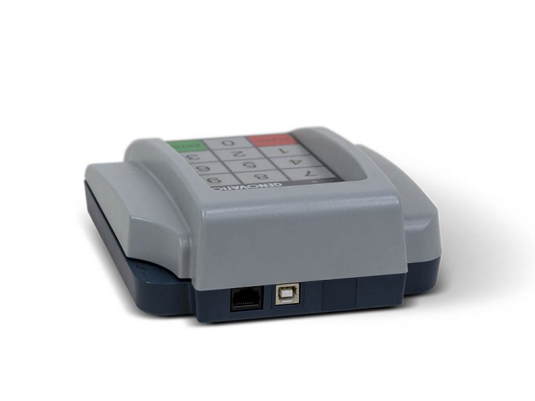 Gray keypad machine on white background