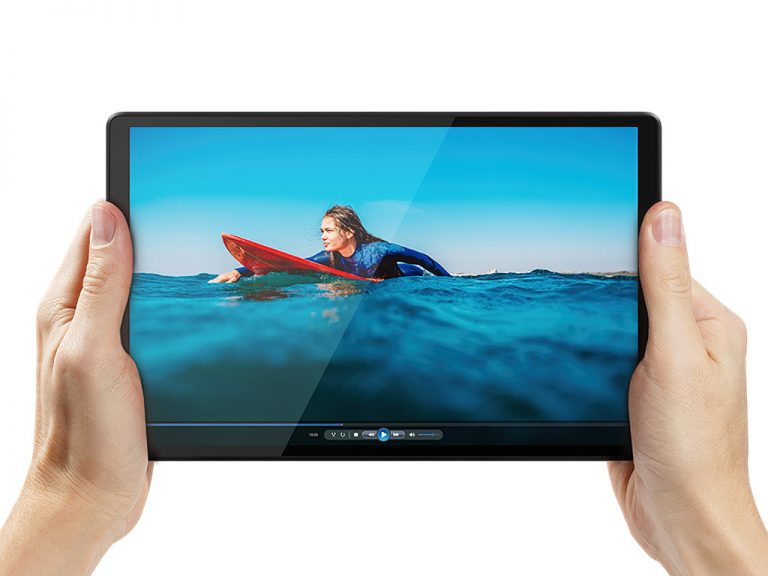 Tablet displaying surfer on ocean wave