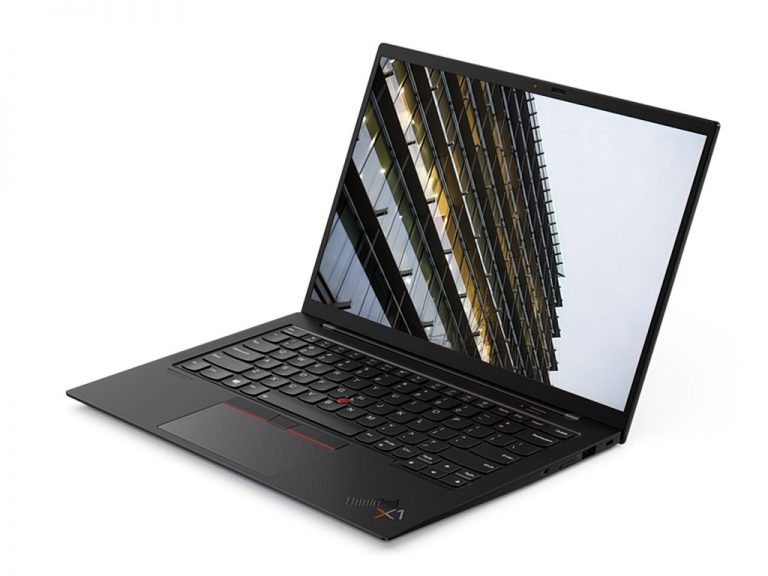 Open laptop displaying building reflection