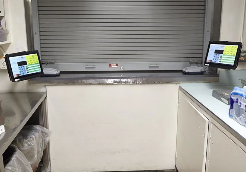 Snacks displayed with tablets on counter