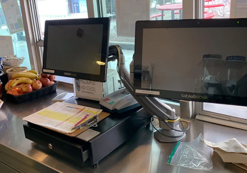 Checkout counter with dual monitors